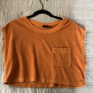 Orange cropped shirt